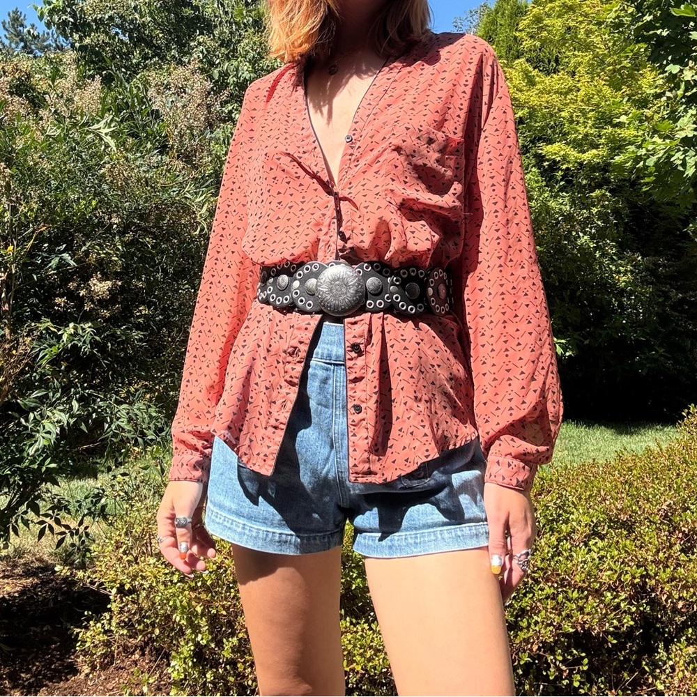Sheer rust colored blouse